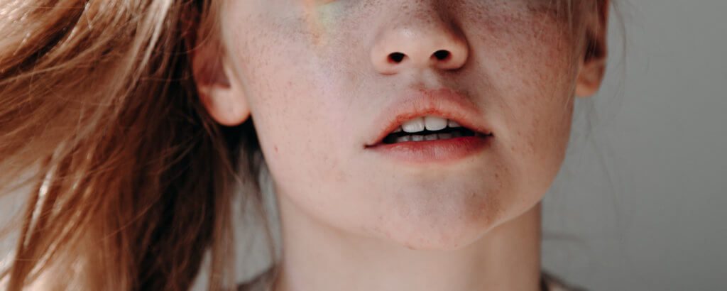 image of lower half of woman's face
